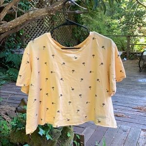 Pastel yellow palm tree crop top